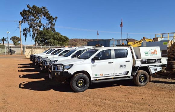 RPM Contracting field service utes lined up at the Newman depot